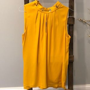 Mustard color top.